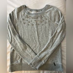 Abercrombie sweater size small, grey with rhinestone design around neck line
